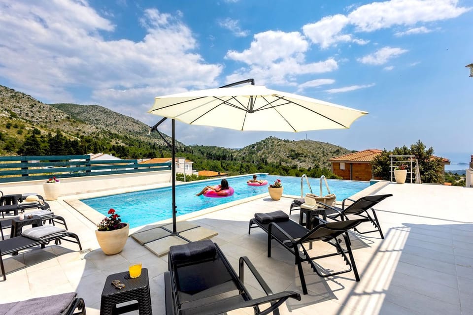 Patio, Day, Balcony/Terrace, Mountain view, Pool view, Sea view, Swimming pool, Swimming pool, sunbed