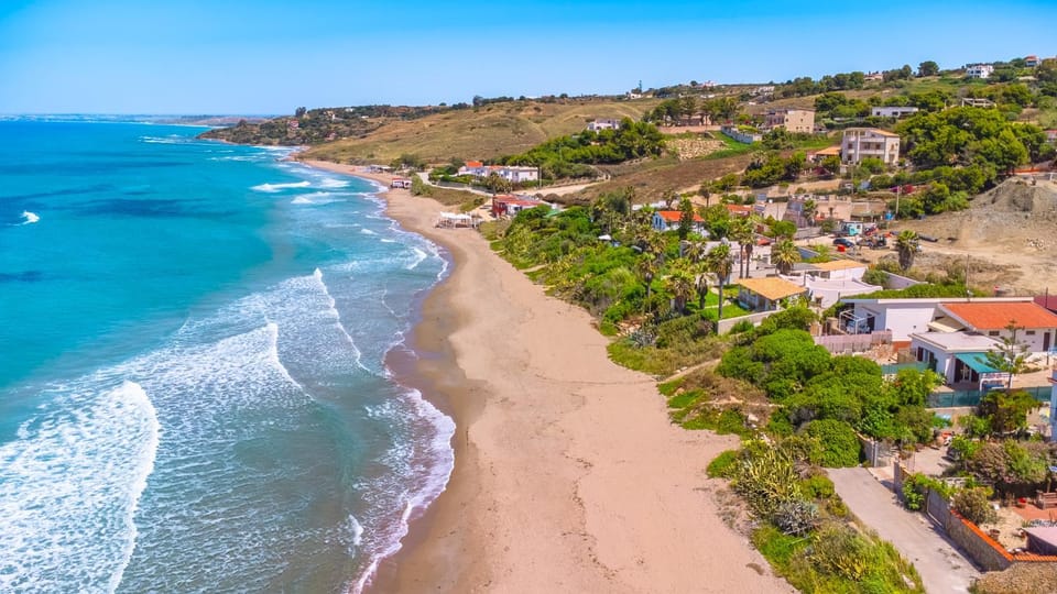 Property building, Nearby landmark, Day, Natural landscape, Bird's eye view, Beach, Mountain view, Sea view