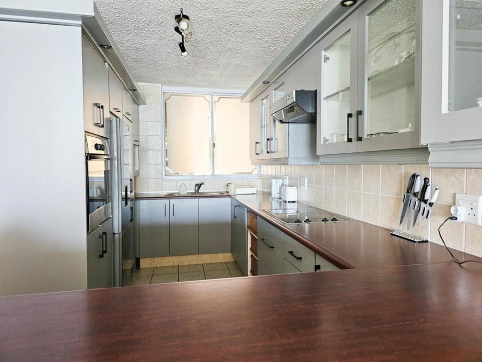 Kitchen or kitchenette, oven, stove