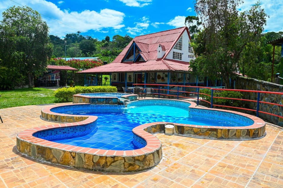 Property building, Patio, Day, Natural landscape, Garden, Garden view, Pool view, Swimming pool, sunbed
