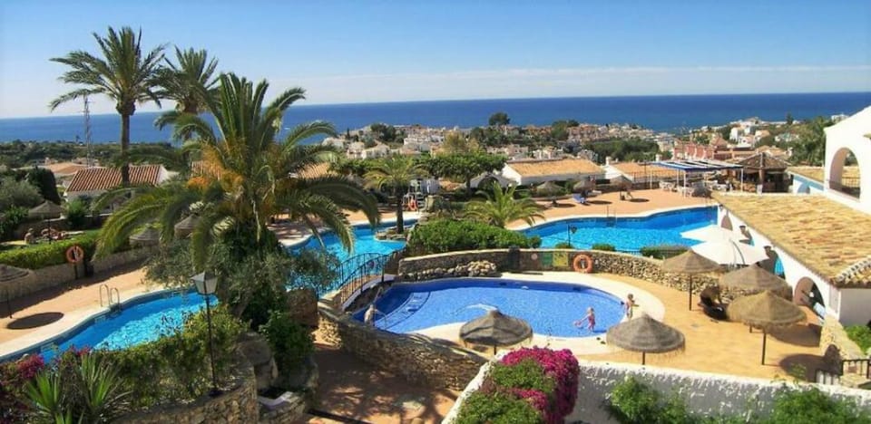 Right by the pool area in Capistrano Village Apartment in Nerja