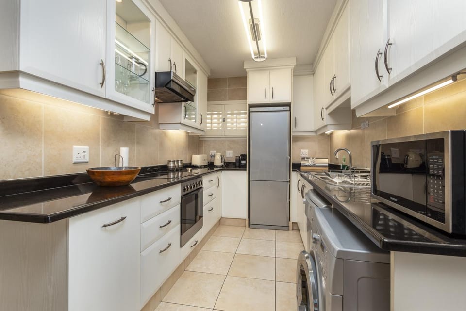 Kitchen or kitchenette, oven, stove, toaster
