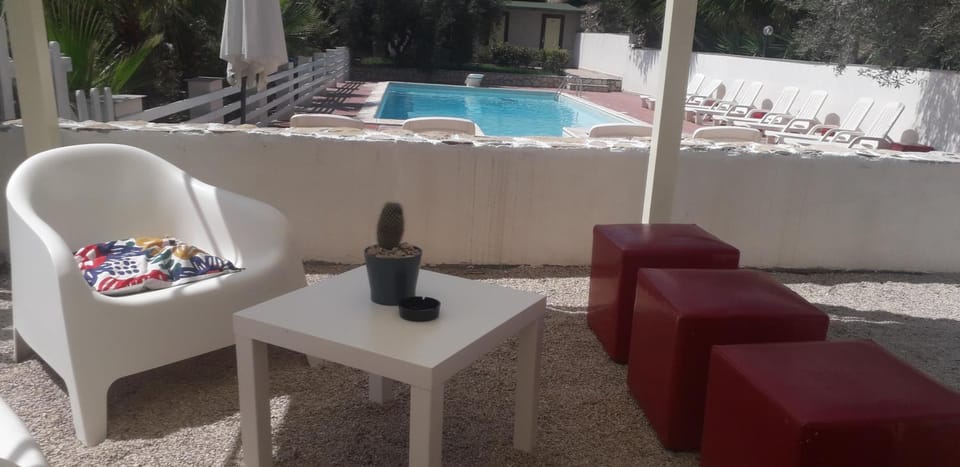 Patio, Day, Pool view, Swimming pool, Swimming pool, sunbed