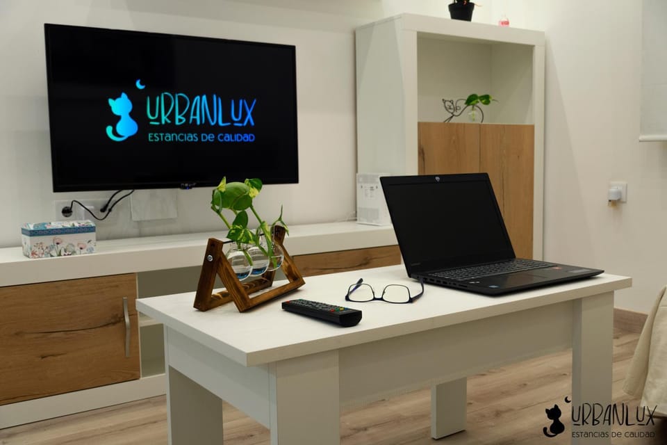 Property logo or sign, TV and multimedia, Living room, Seating area