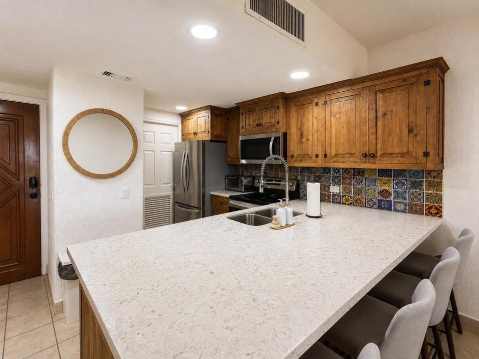 Kitchen or kitchenette, dishwasher, microwave, oven, stove, toaster, kitchen