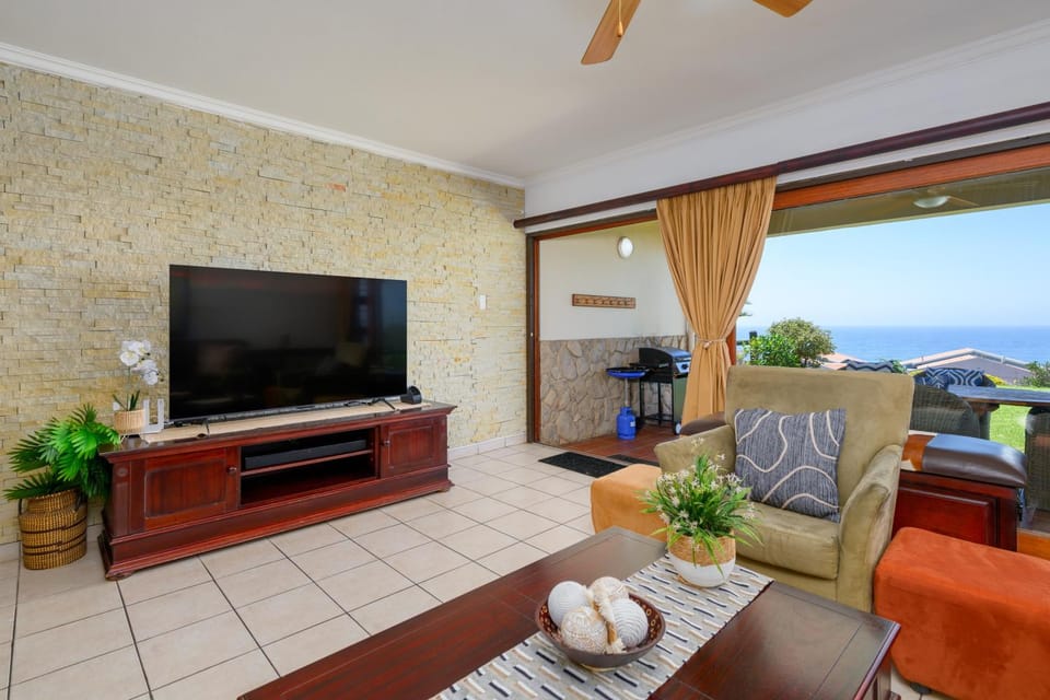 Patio, TV and multimedia, Living room, Seating area, Sea view