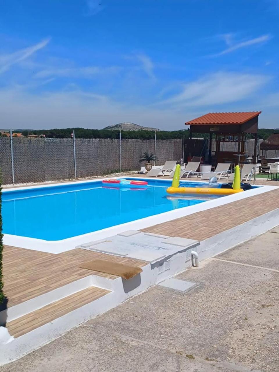 Swimming pool, sunbed