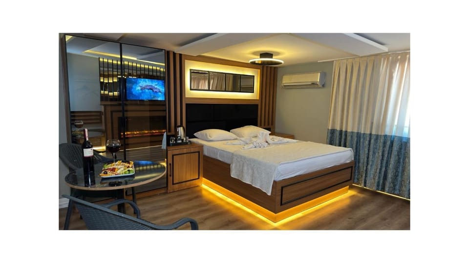 Bed, TV and multimedia, Photo of the whole room, air conditioner