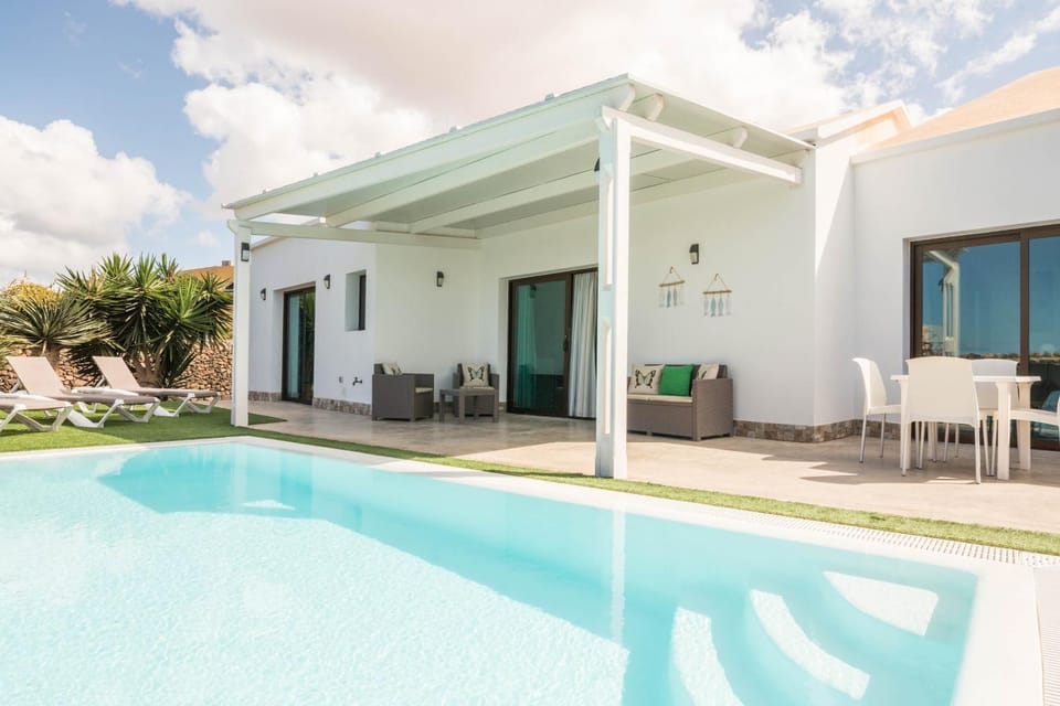 Property building, Living room, Swimming pool