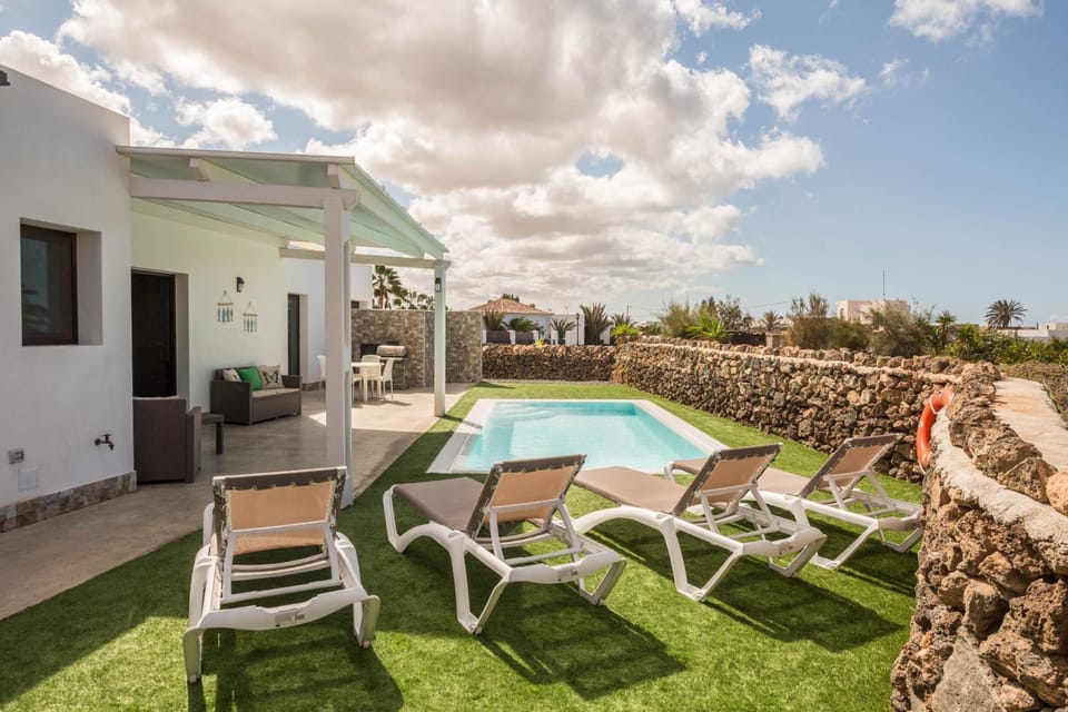 Property building, Living room, Swimming pool