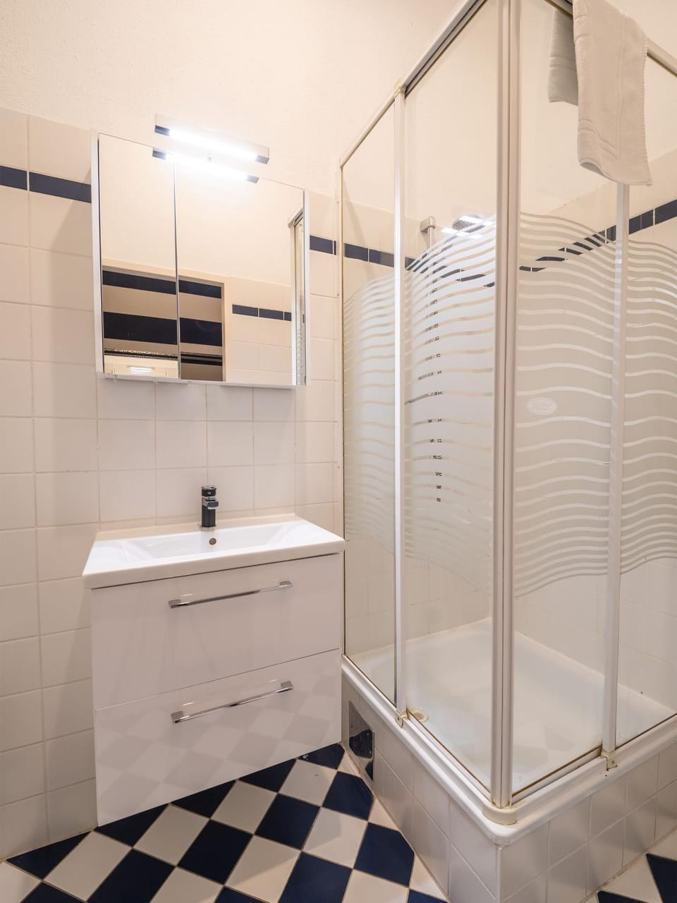 Shower, Bathroom, Decorative detail, hair dryier, towels