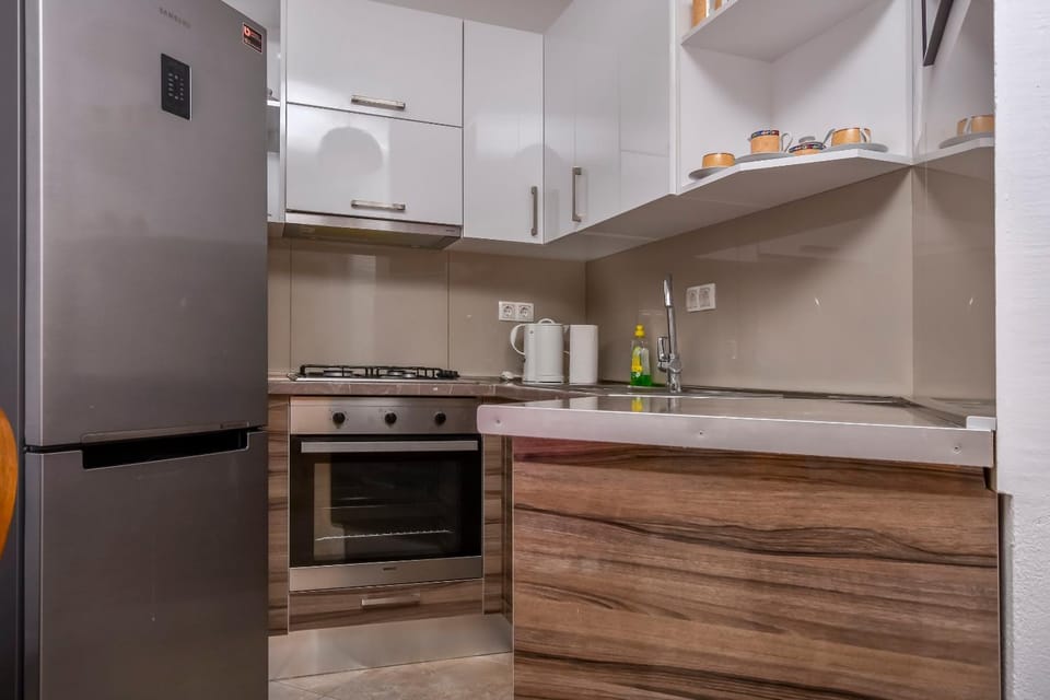 Kitchen or kitchenette, oven, stove