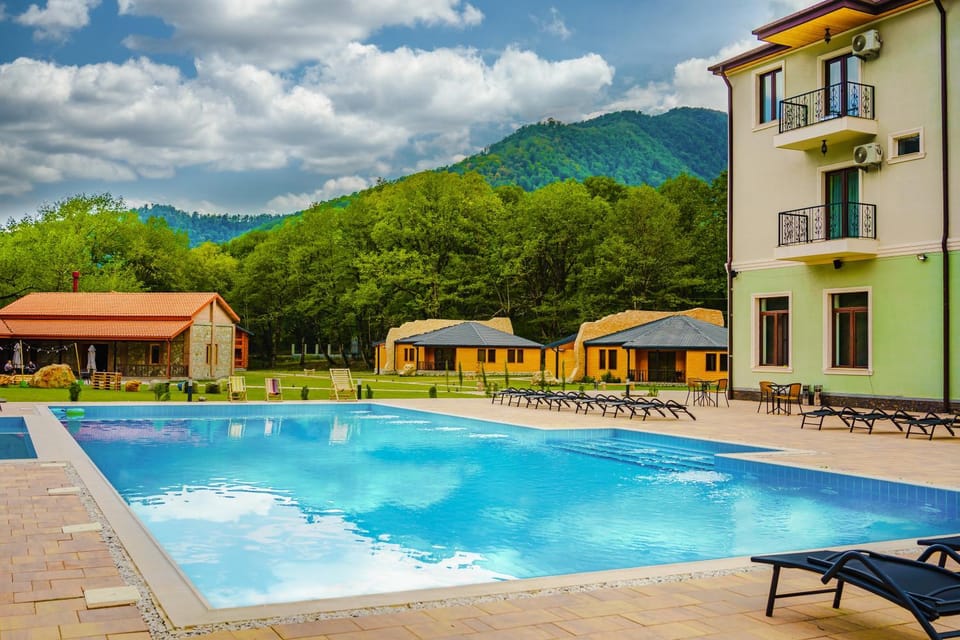 Property building, Restaurant/places to eat, Natural landscape, View (from property/room), Mountain view, Swimming pool