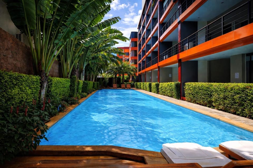 Property building, Swimming pool, sunbed