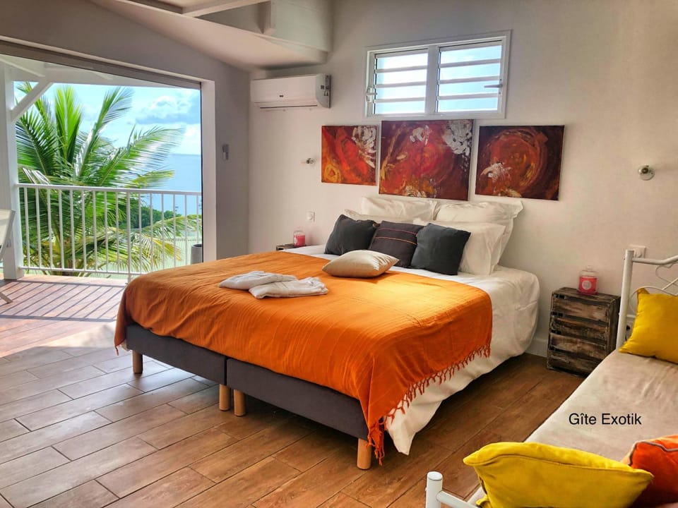 Patio, Bed, Photo of the whole room, Bedroom, Sea view, air conditioner