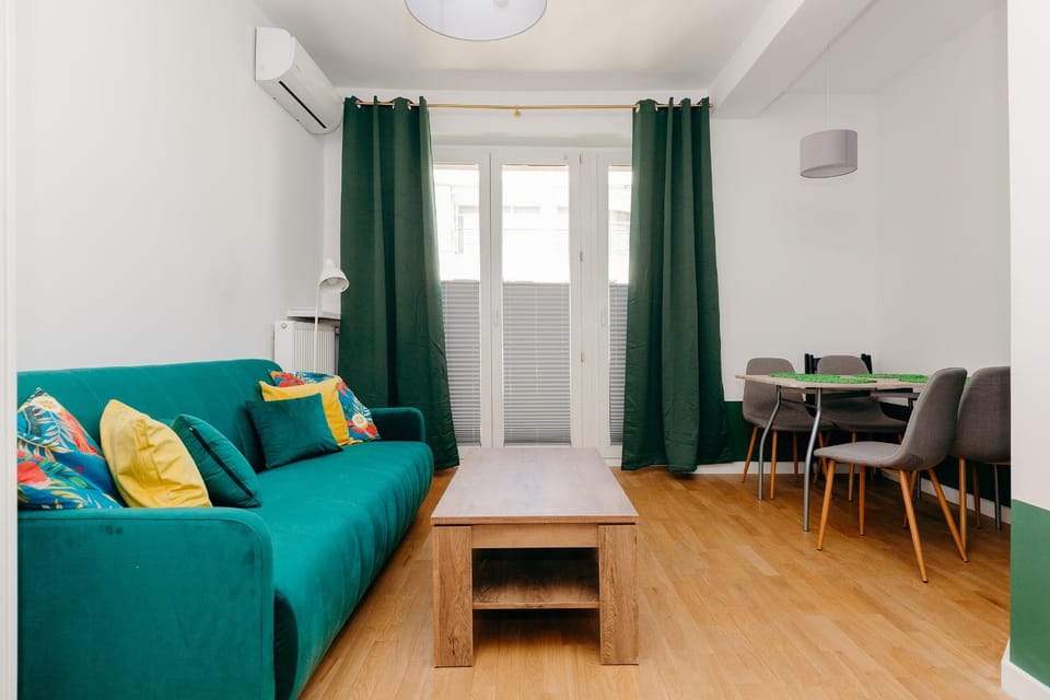 Bed, Living room, Seating area, Dining area
