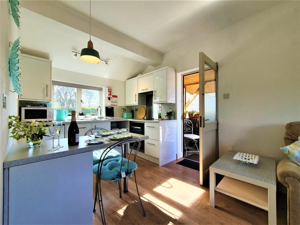 Kitchen or kitchenette, Living room, Dining area, Garden view, Landmark view, Mountain view