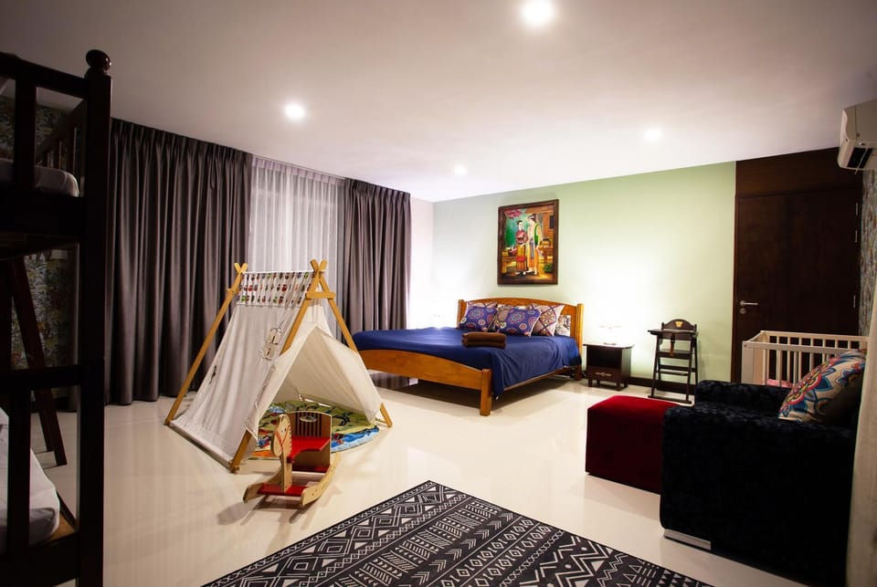 Bed, Children play ground, Living room, Photo of the whole room, Seating area, Bedroom, children, towels, air conditioner