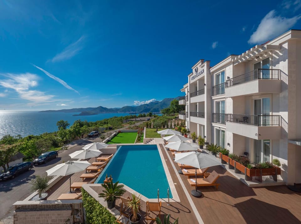 Property building, Day, Natural landscape, Mountain view, Pool view, Sea view, Swimming pool
