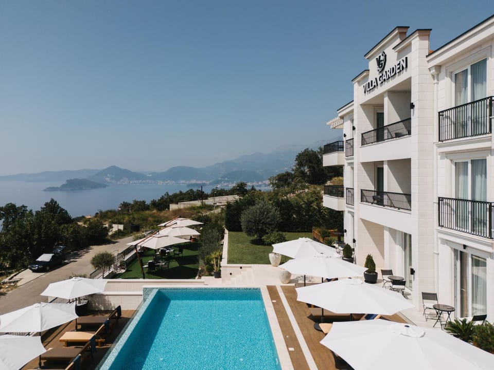 Property building, Day, Natural landscape, Mountain view, Pool view, Sea view, Swimming pool, sunbed