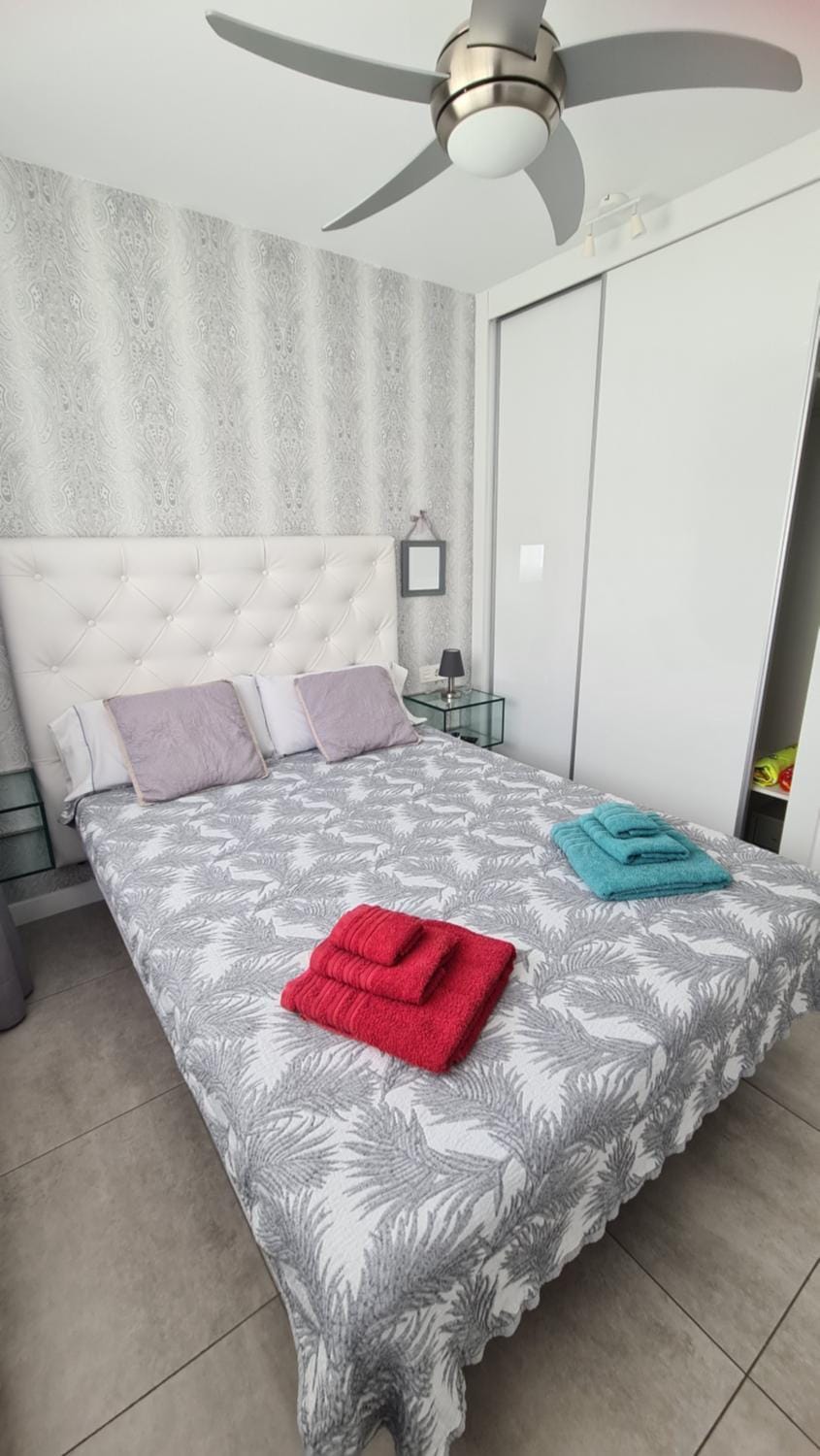 Bed, Photo of the whole room, Bedroom, fireplace, towels, wardrobe