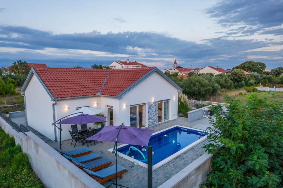 Villa Nicolle only 50meters from the beach - by TA Leut Agency Villa in Zadar County