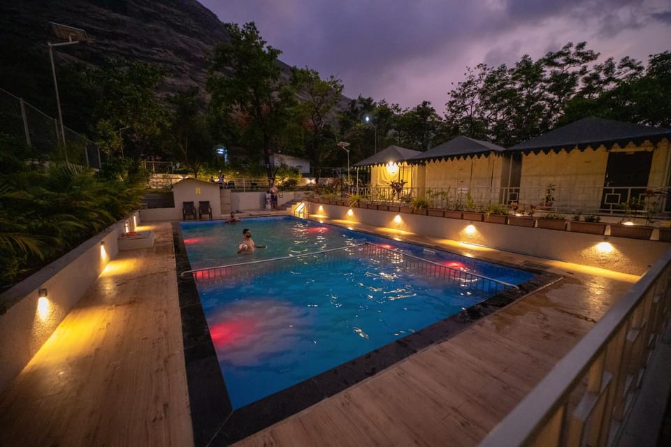 Property building, Night, Natural landscape, Pool view, Swimming pool