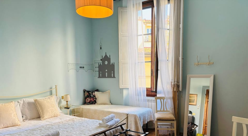 Property building, Living room, Seating area, Bedroom