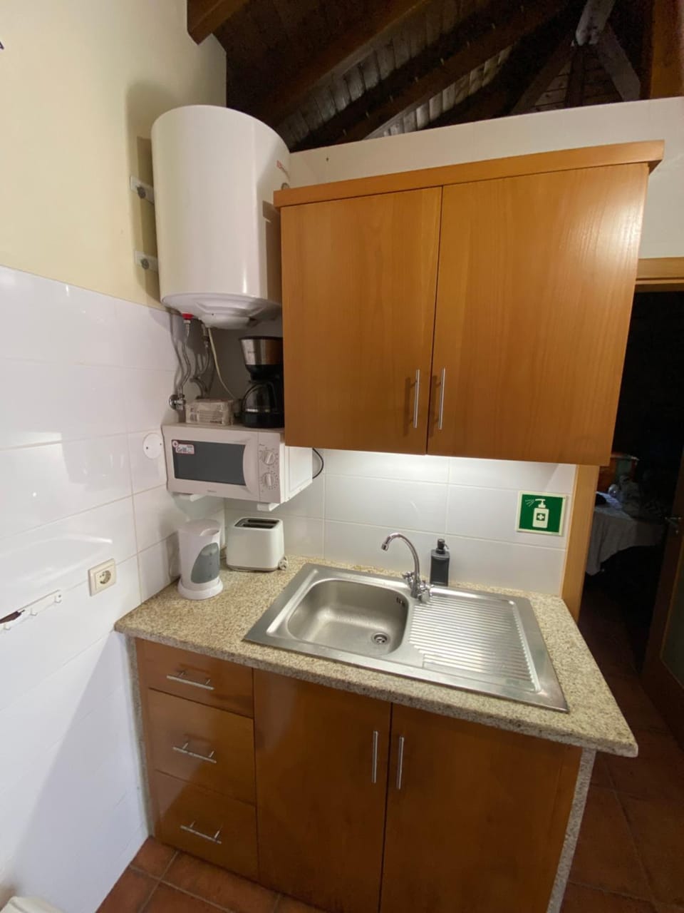 Kitchen or kitchenette, microwave, toaster