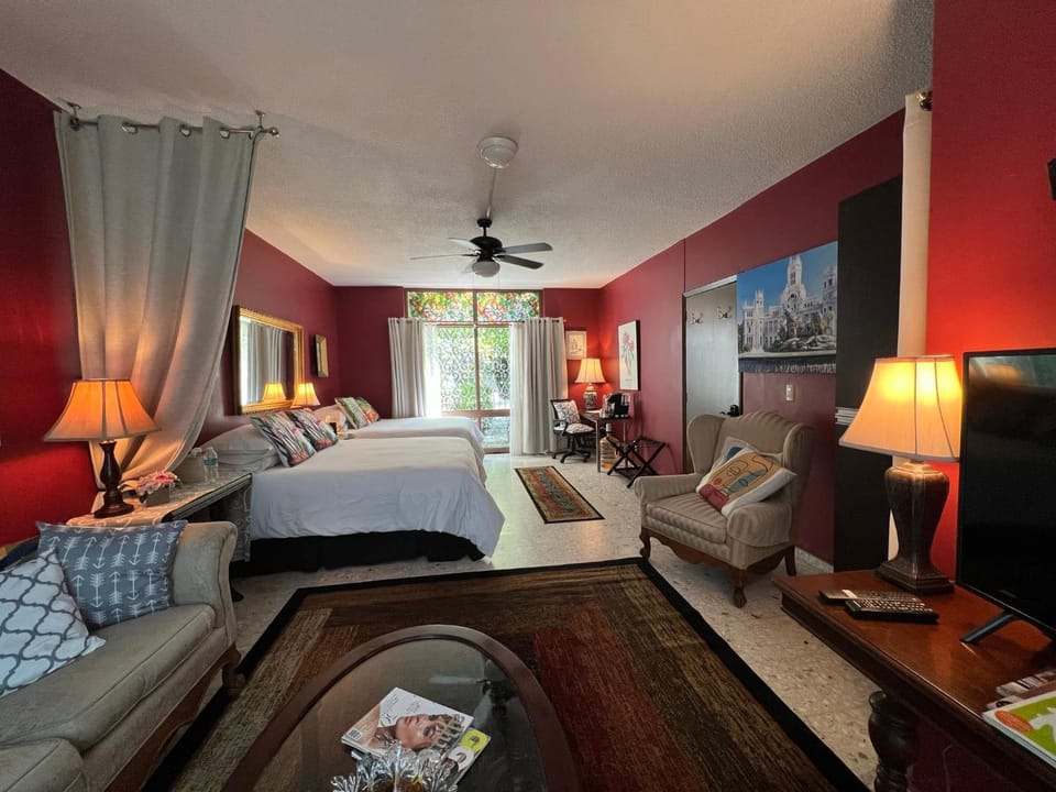 Bed, TV and multimedia, Living room, Seating area, Bedroom, Garden view, Garden view