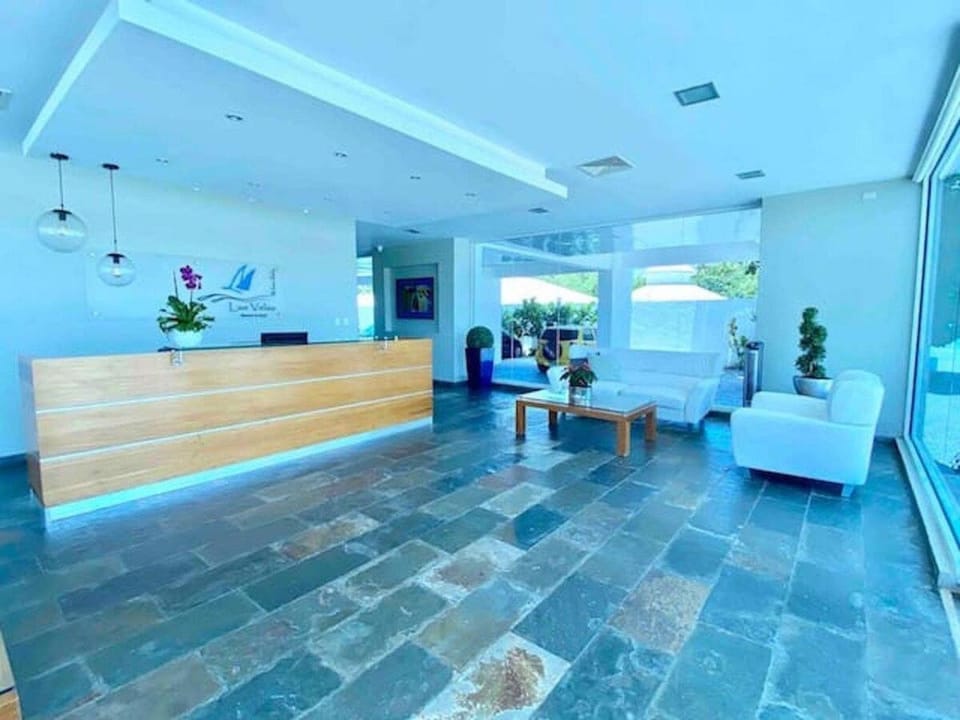 People, Living room, Lobby or reception, Seating area, group of guests