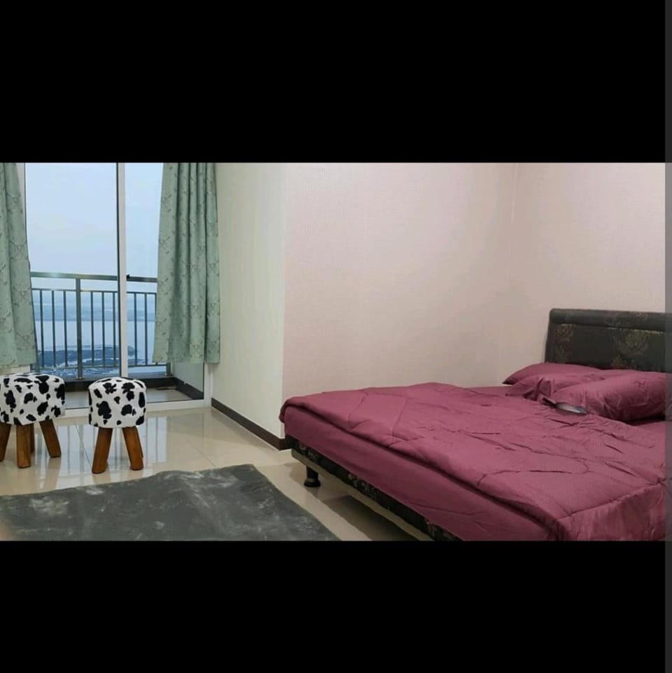 2 BR Jungle Decor Beautiful Sea View Fast Internet Top Of The Mall Apartment in Jakarta