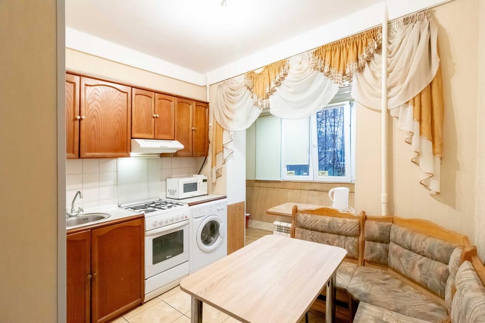 Kitchen or kitchenette, microwave, oven, stove, washing machine, kitchen
