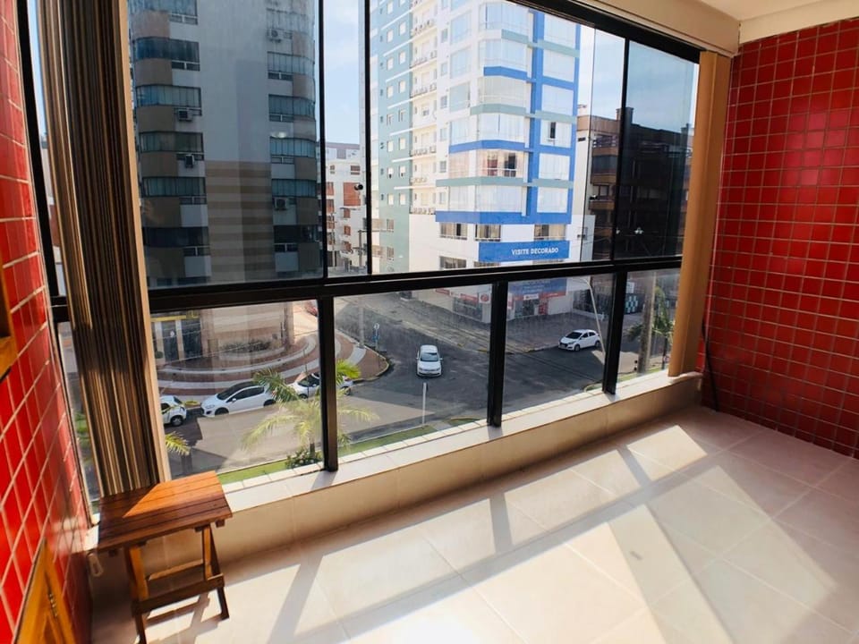 Apto com suíte e vista para o mar com churrasqueira, wi-fi e net. Apartment in State of Rio Grande do Sul