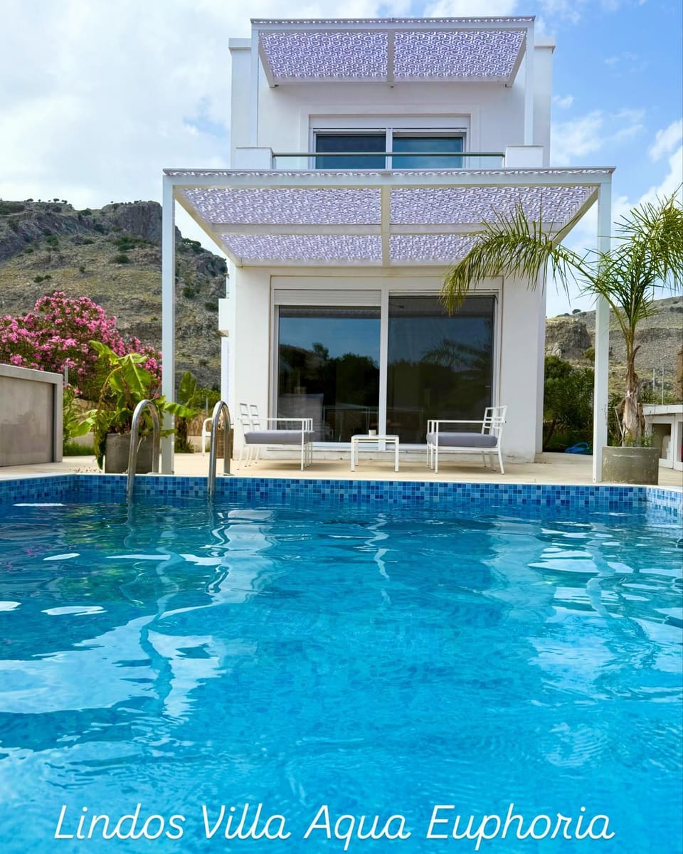 Patio, Day, Natural landscape, Pool view, Swimming pool, sunbed