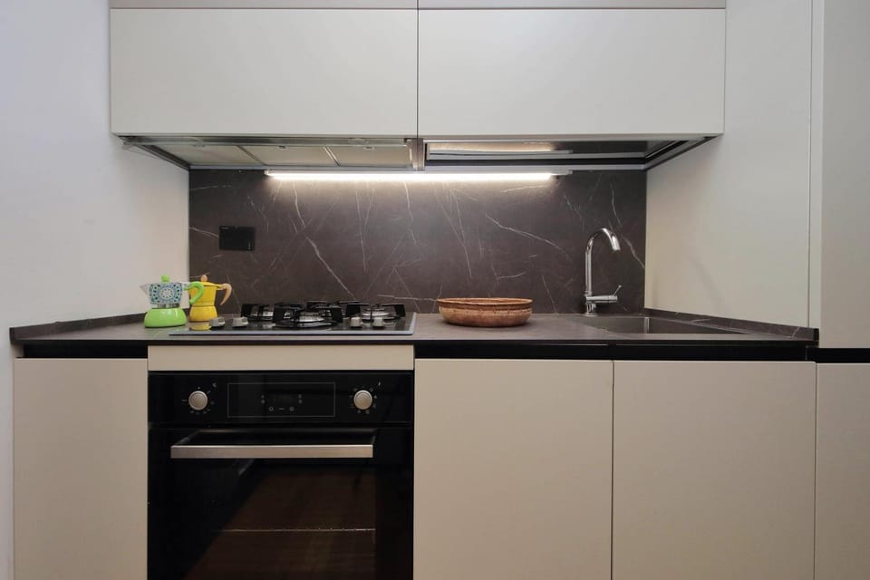 Kitchen or kitchenette, stove
