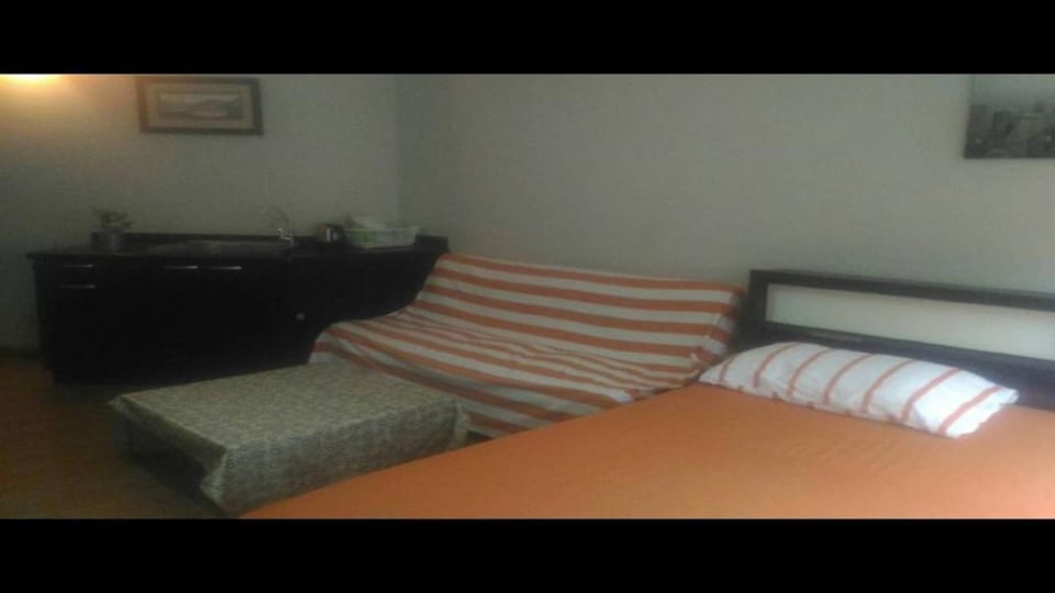 Bed, Seating area, Bedroom