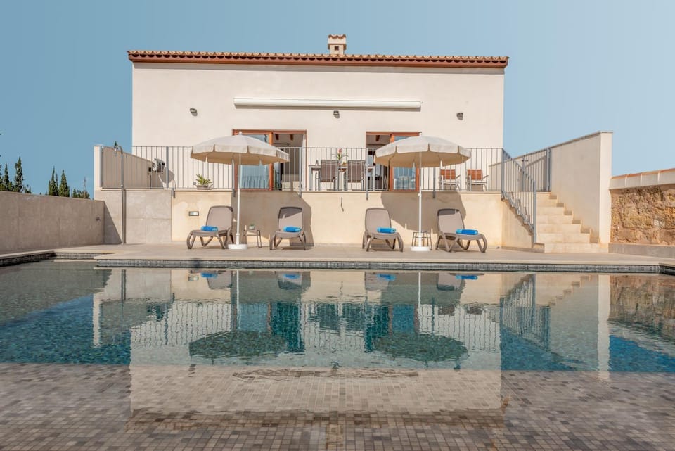 Property building, Living room, Swimming pool