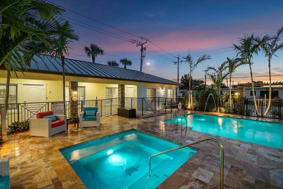 Property building, Patio, Night, Natural landscape, Pool view, Swimming pool, sunbed