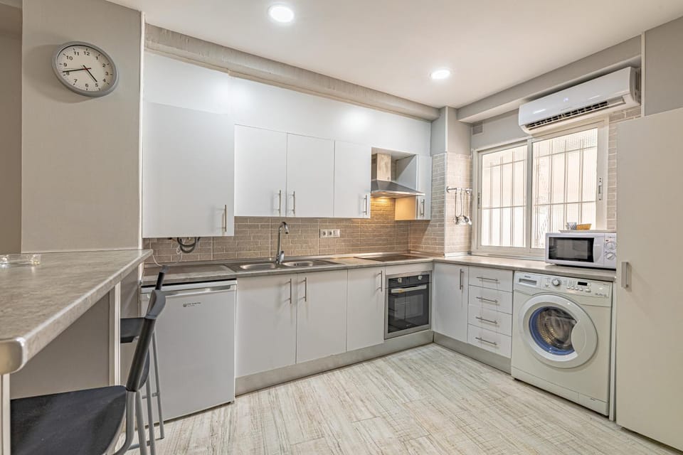 microwave, minibar, oven, stove, kitchen