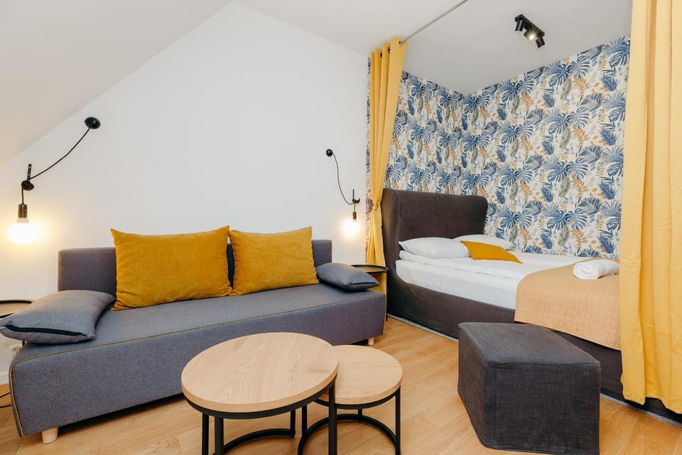 Bed, Living room, Seating area, Bedroom