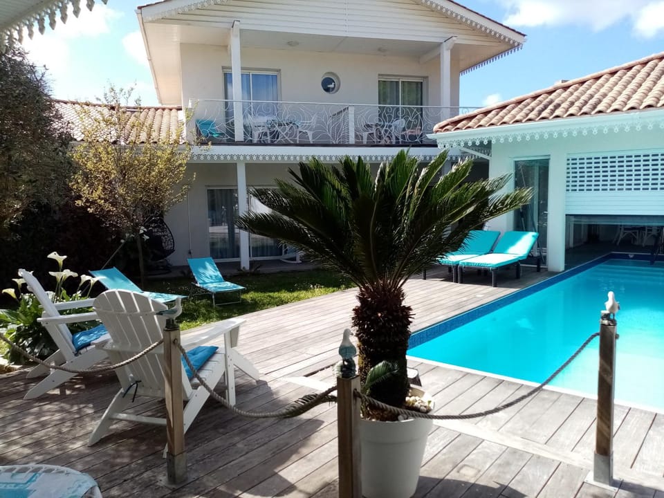 Property building, Patio, Balcony/Terrace, Garden view, Pool view, Swimming pool