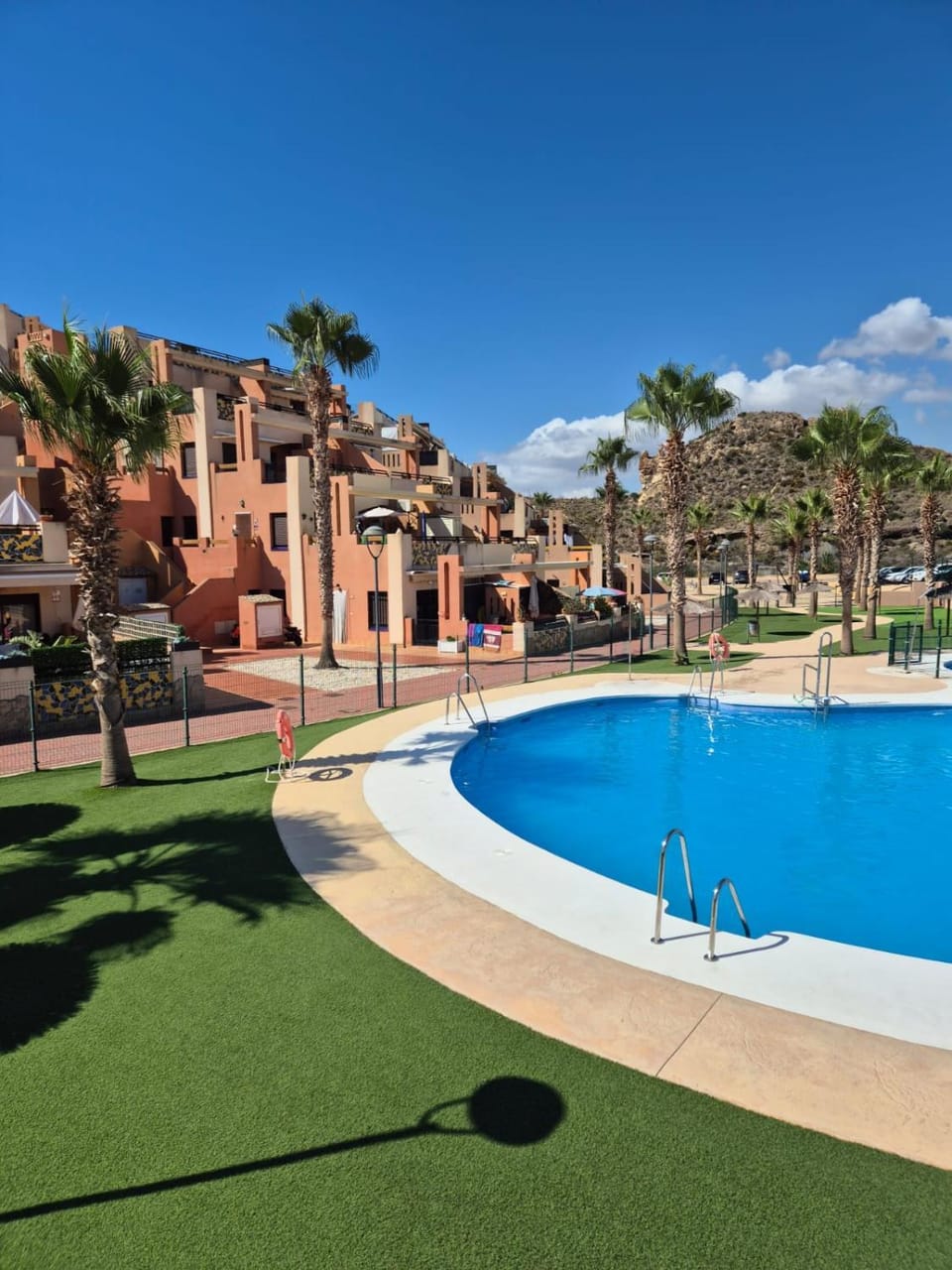 Property building, Day, Pool view, Swimming pool, sunbed