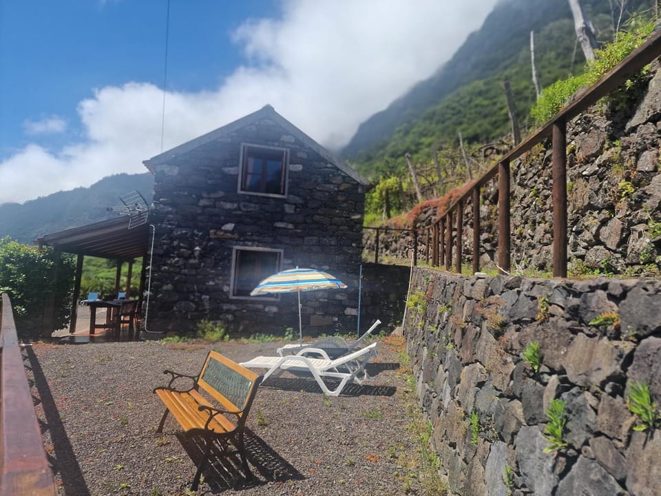 Property building, Patio, Natural landscape, Mountain view, sunbed