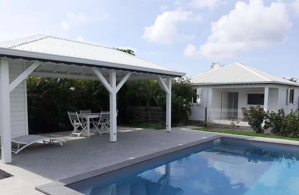 Property building, Swimming pool, Swimming pool, sunbed