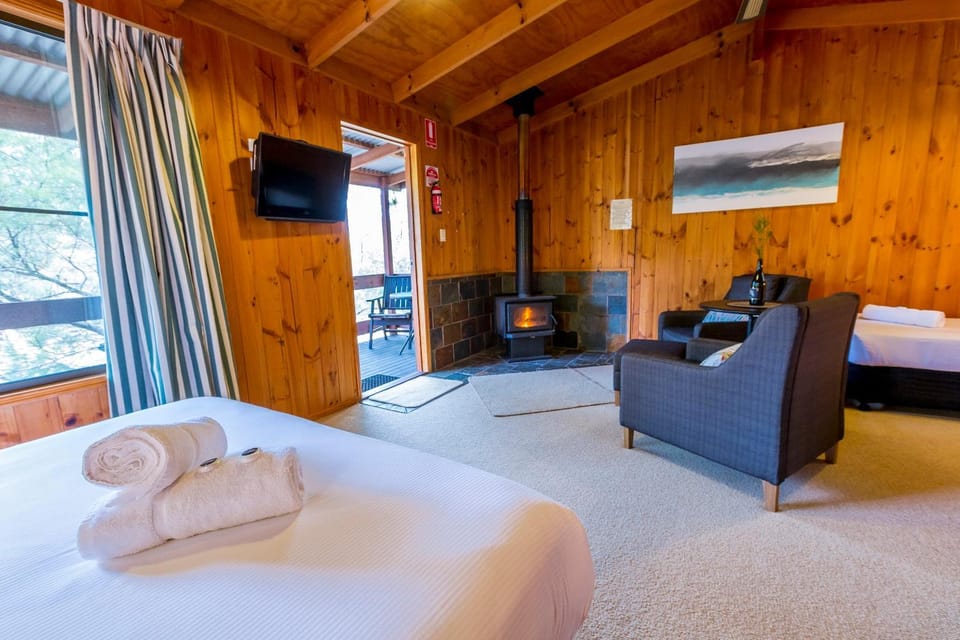 Bed, Living room, Seating area, Bedroom