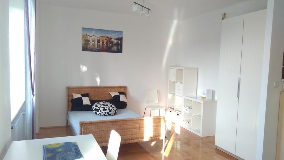 Bed, Living room, Seating area, Bedroom