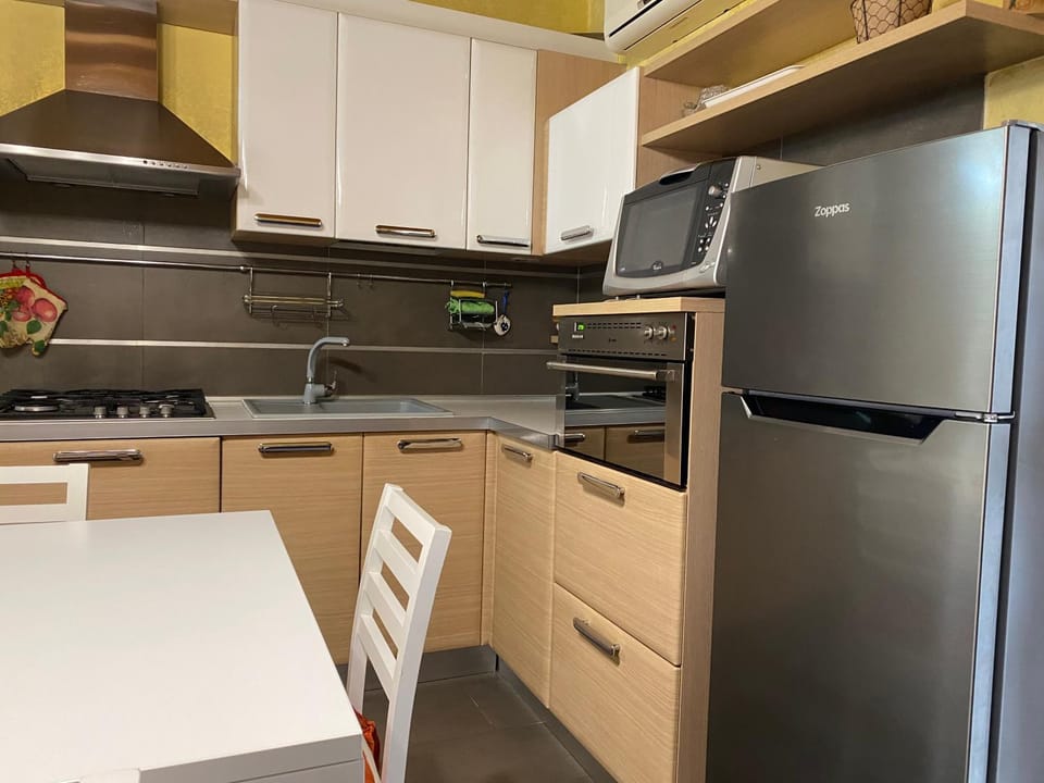 Kitchen or kitchenette, oven, stove