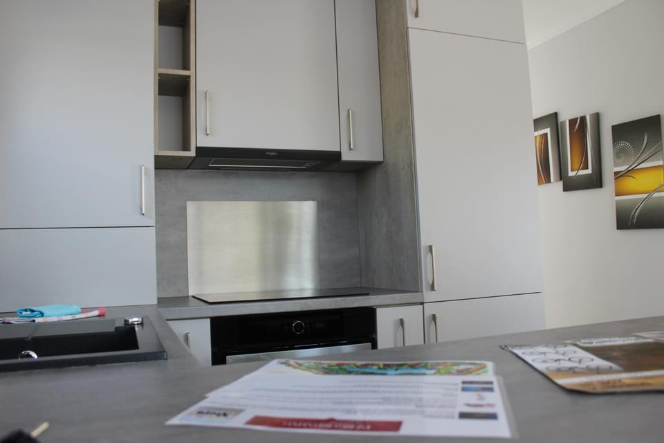Kitchen or kitchenette, stove