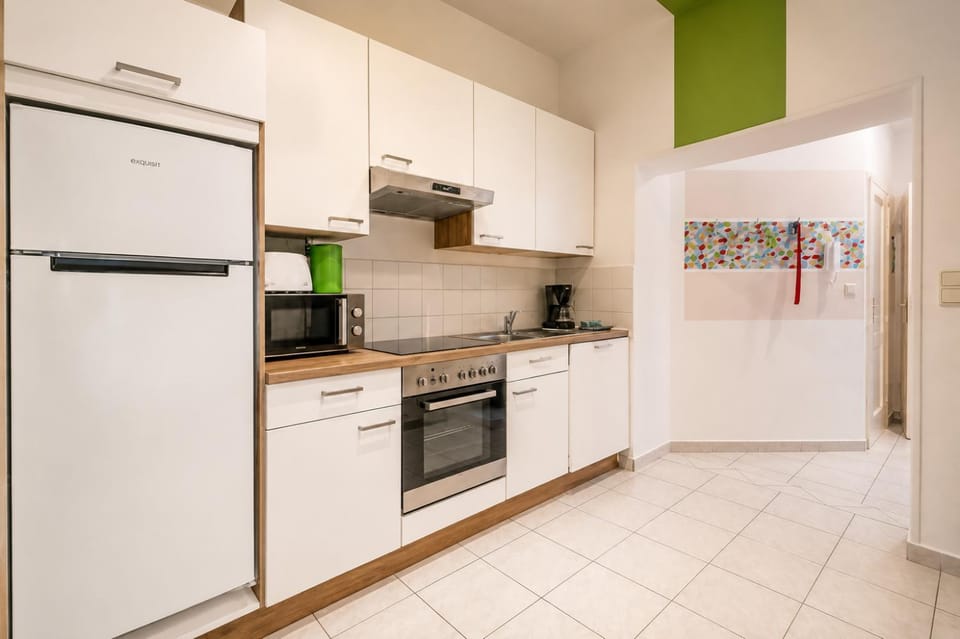Kitchen or kitchenette, storage, stove, kitchen